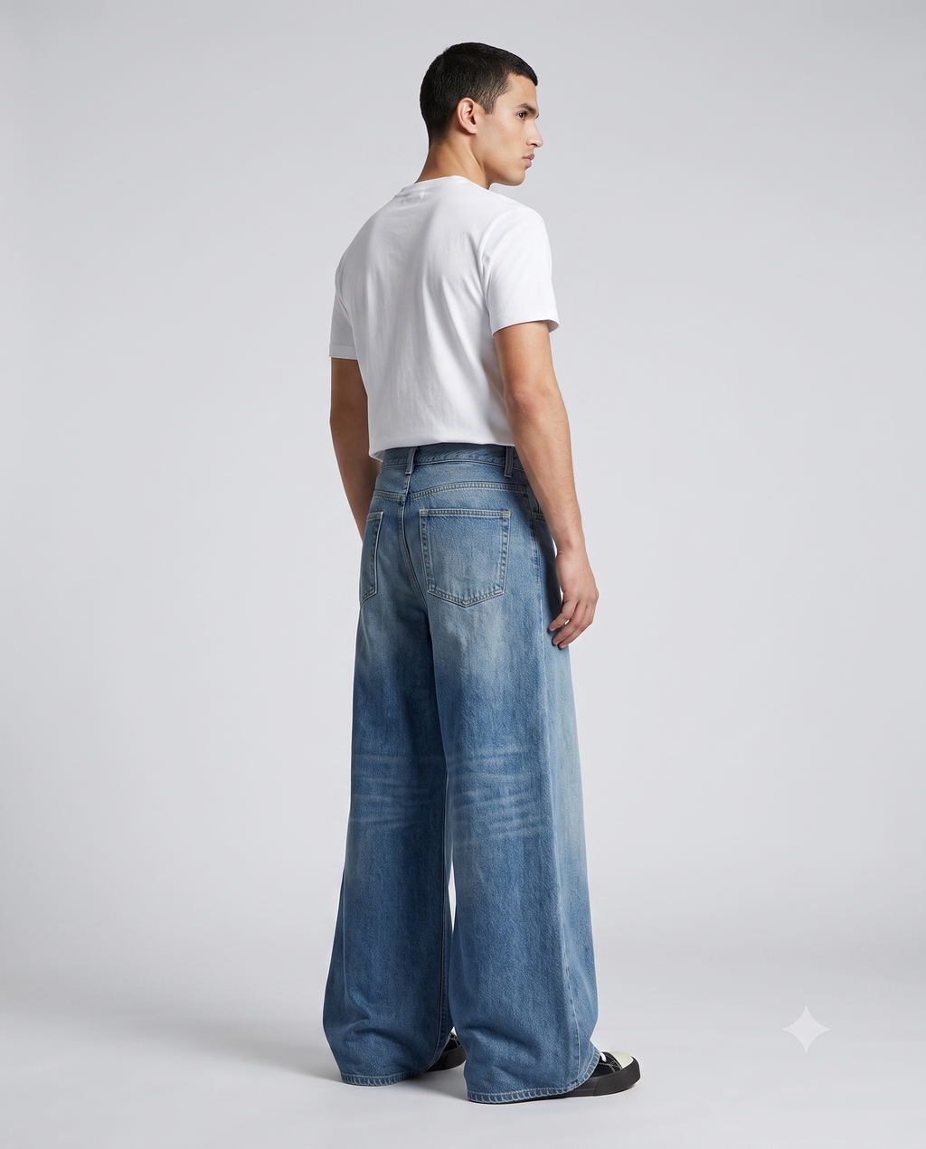 Boulevard Wide Leg Jeans — Washed Blue on model — three-quarter view