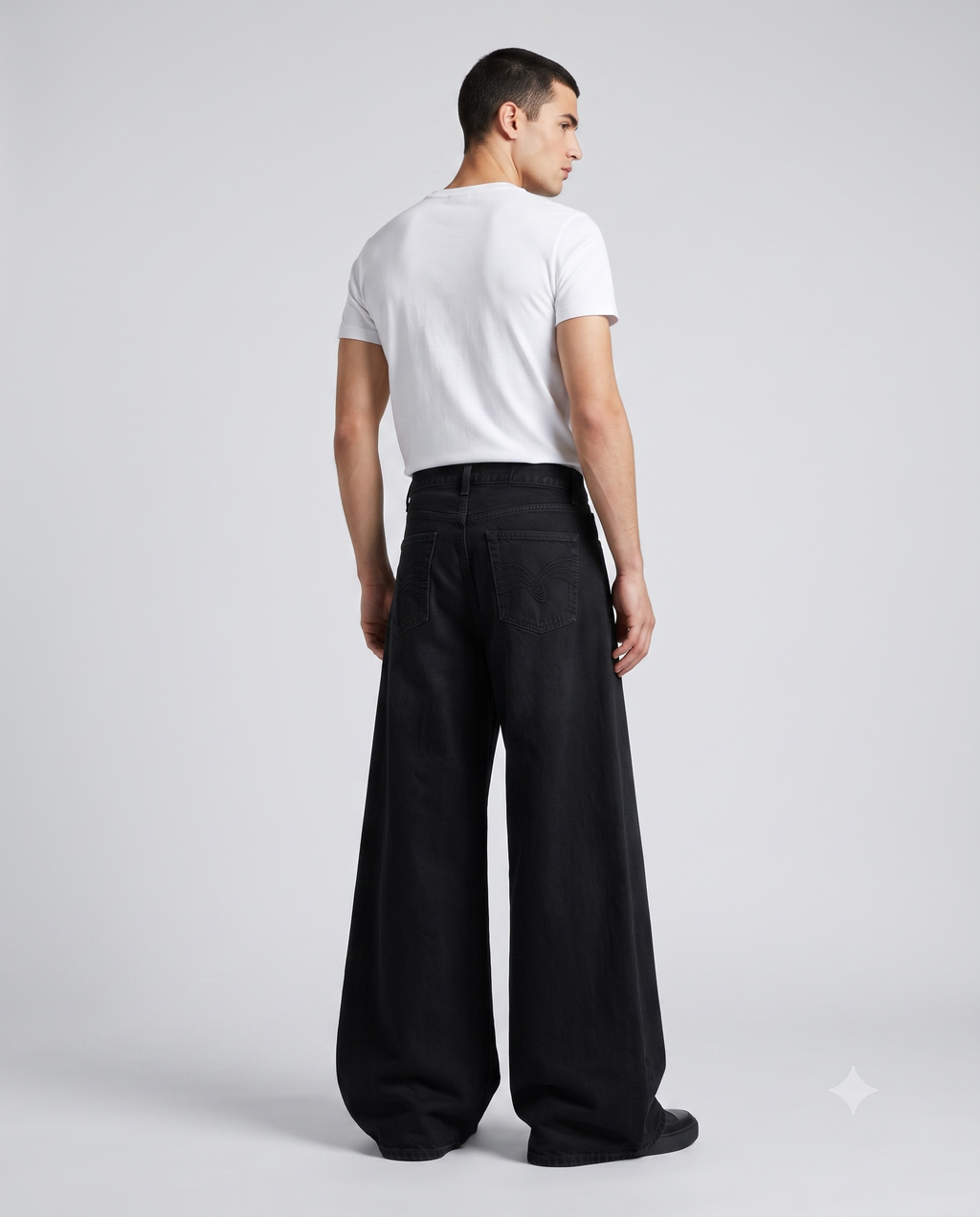 Session Baggy Jeans Jet Black Embroidered on model — three-quarter view