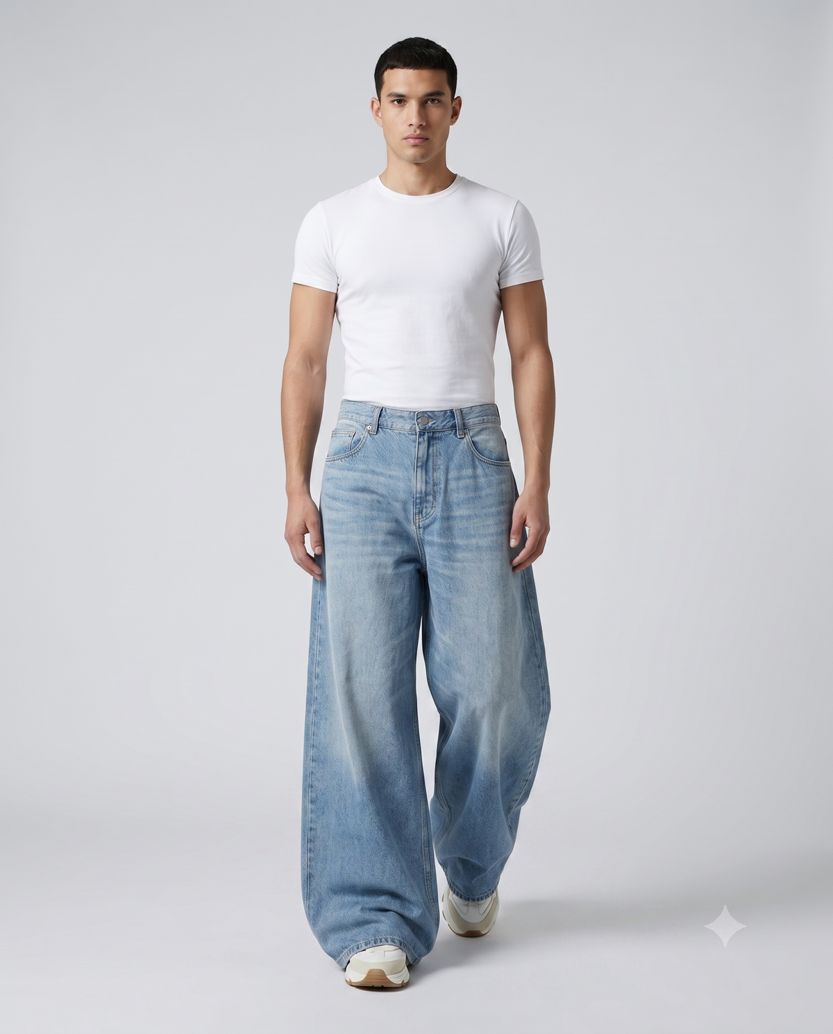 Big Easy Baggy Jeans — Light Wash on model — walking, fabric in motion
