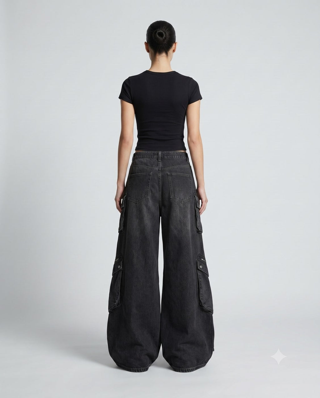 Women's Cargo Baggy Jeans — Jet Black on model — back view