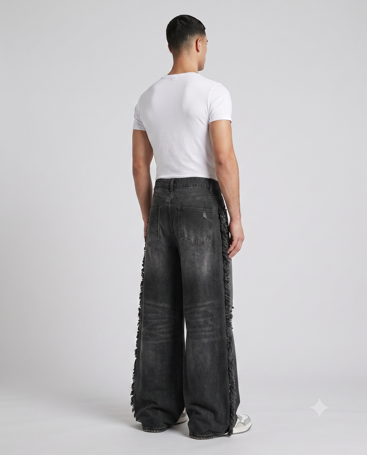 Big Easy Baggy Jeans — Frayed Black on model — three-quarter view