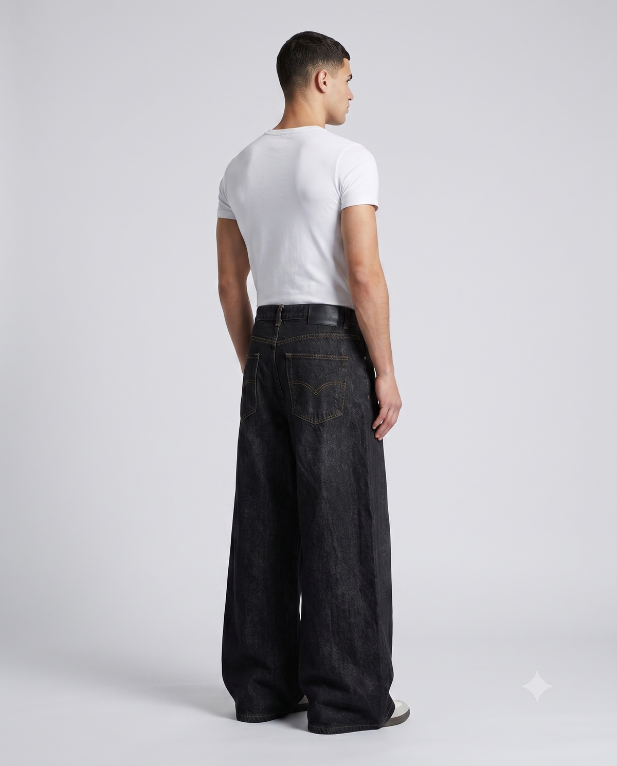 Boulevard Embroidered Jeans — Patch Indigo on model — three-quarter view