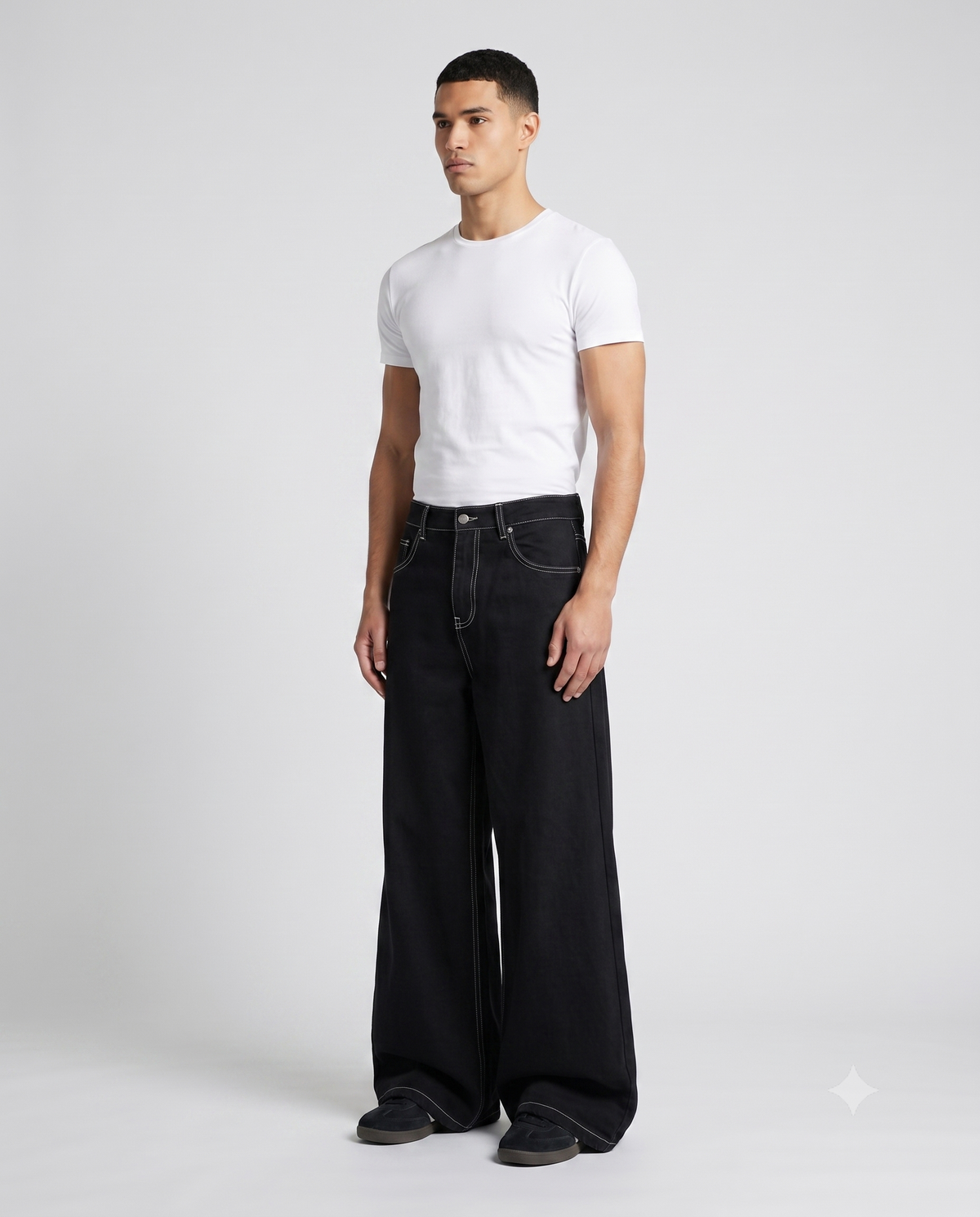 Maxout Jeans — Jet Black on model — three-quarter view