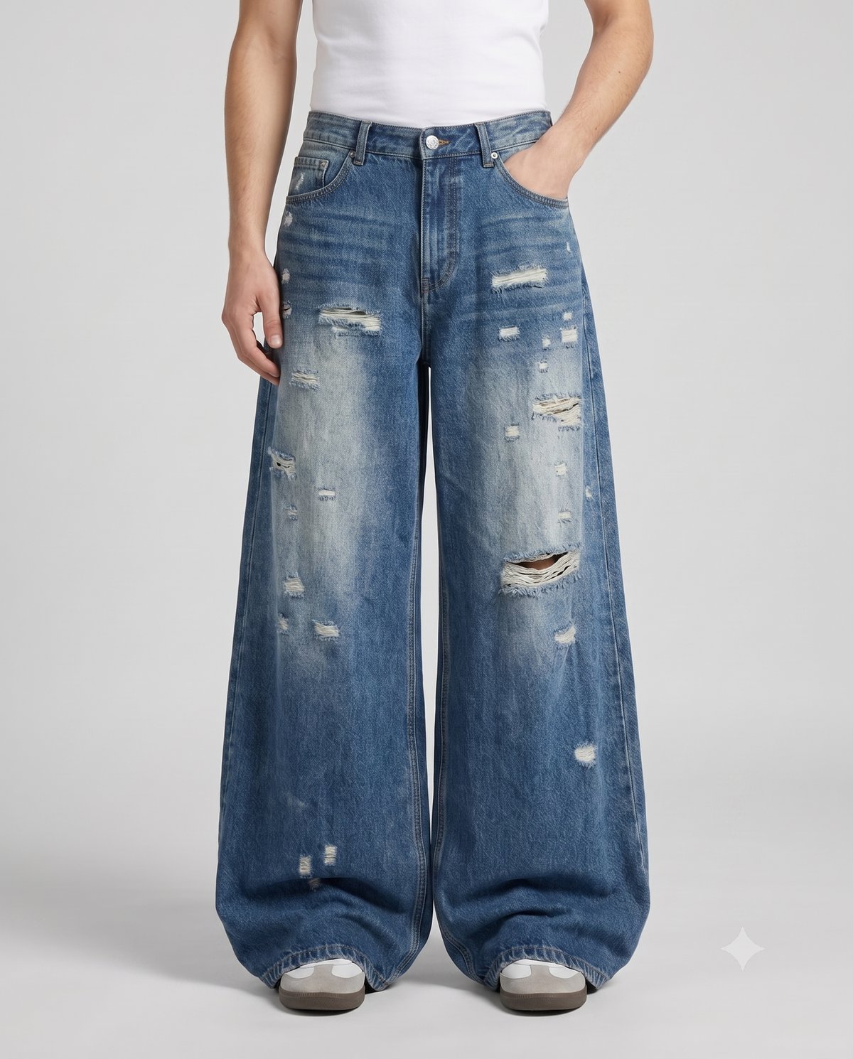 Slack Ripped Jeans Worn Blue on model — waist and pocket detail