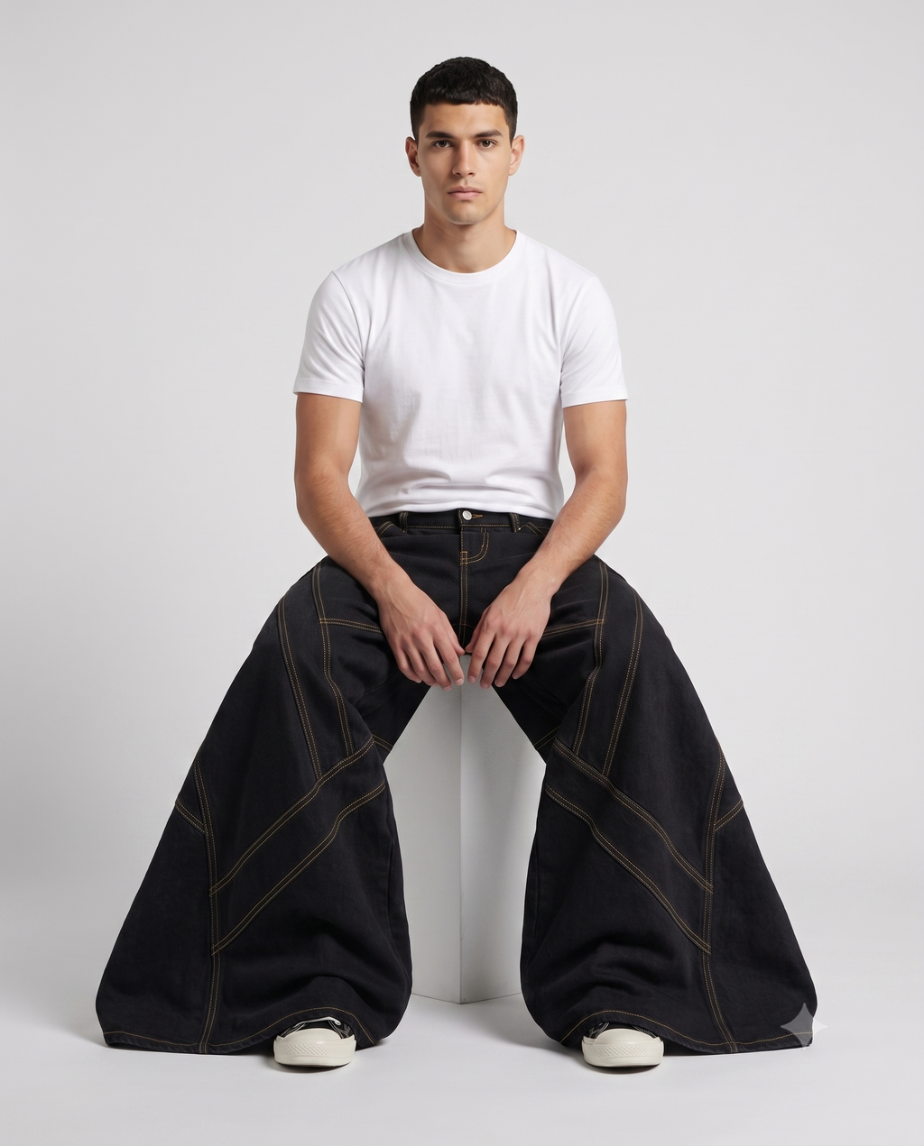 Boulevard Jeans — Gold Seam on model — seated fit view