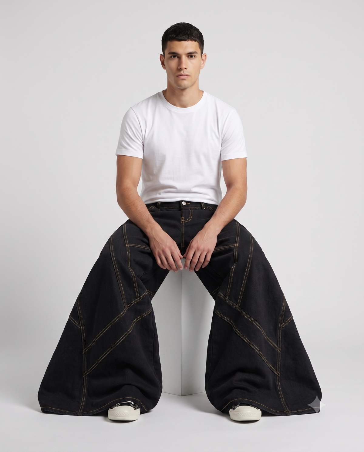 Boulevard Jeans — Gold Seam on model — seated fit view