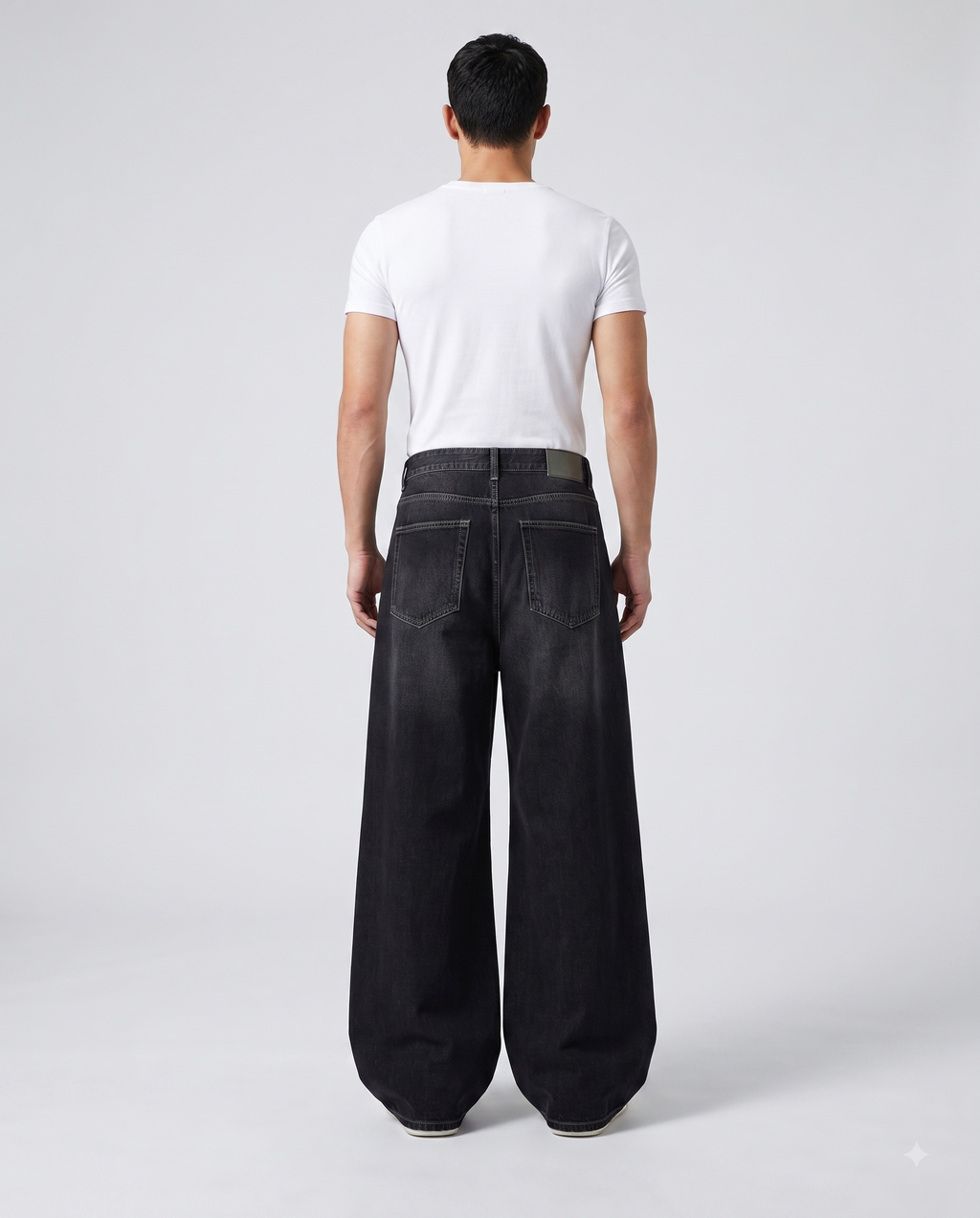 Slack Jeans — Blacktop on model — back view