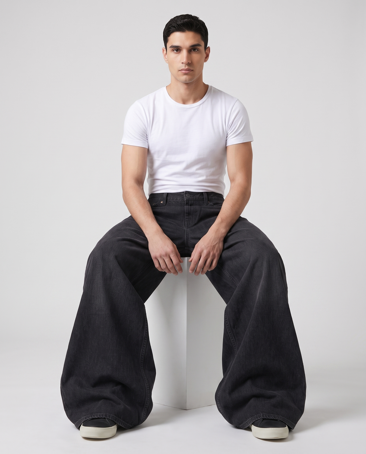 Slack Jeans — Blacktop on model — seated fit view