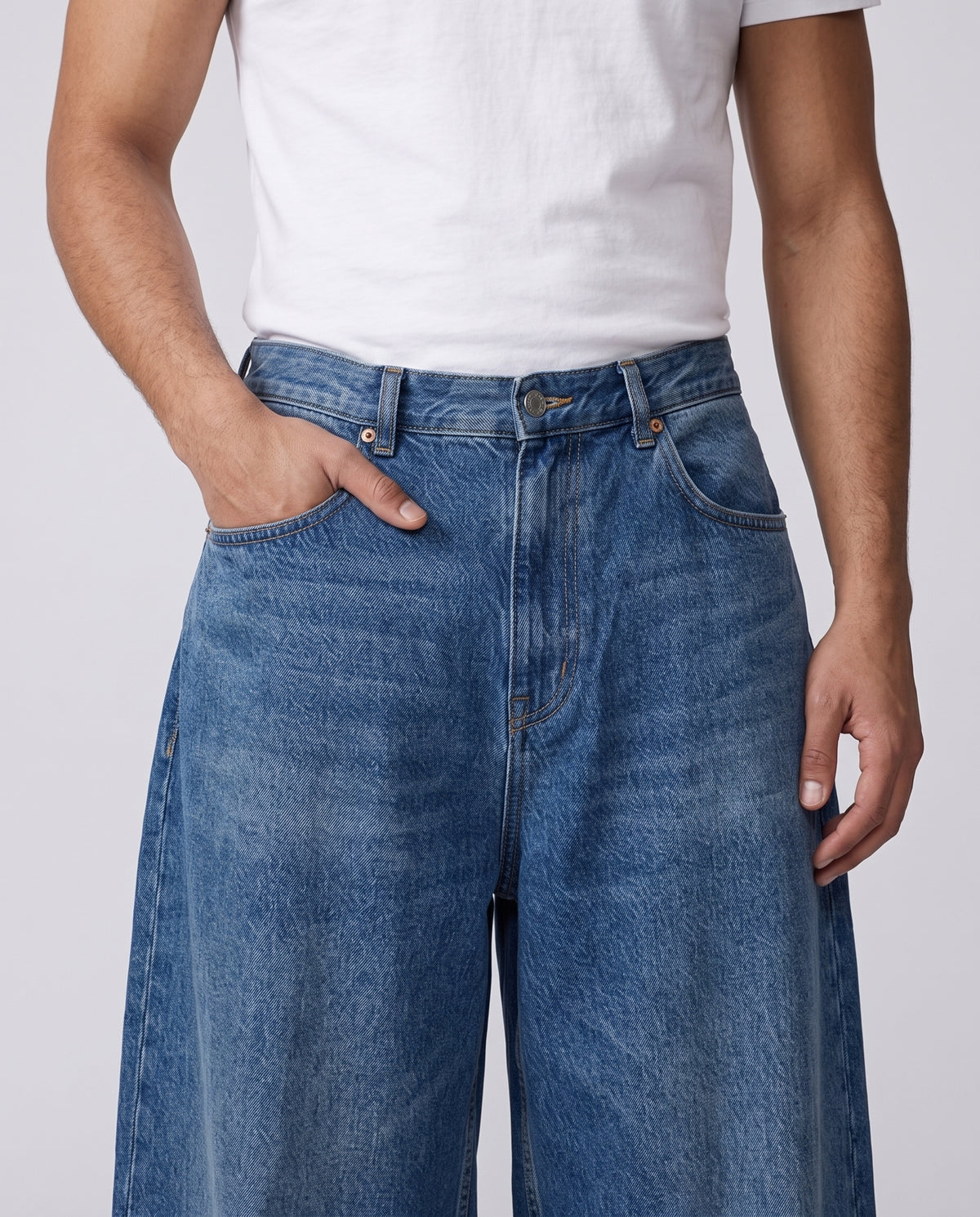 Maxout Jeans Rivet Blue on model — waist and pocket detail