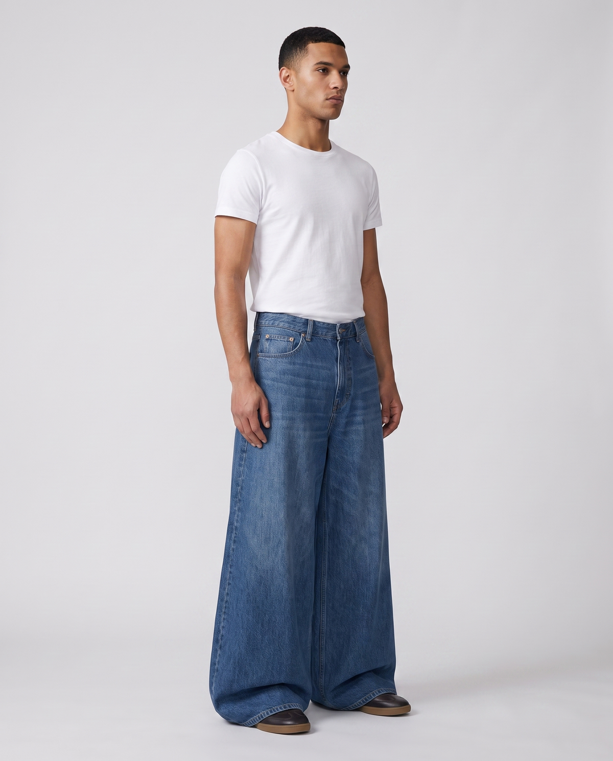 Maxout Jeans — Rivet Blue on model — three-quarter view