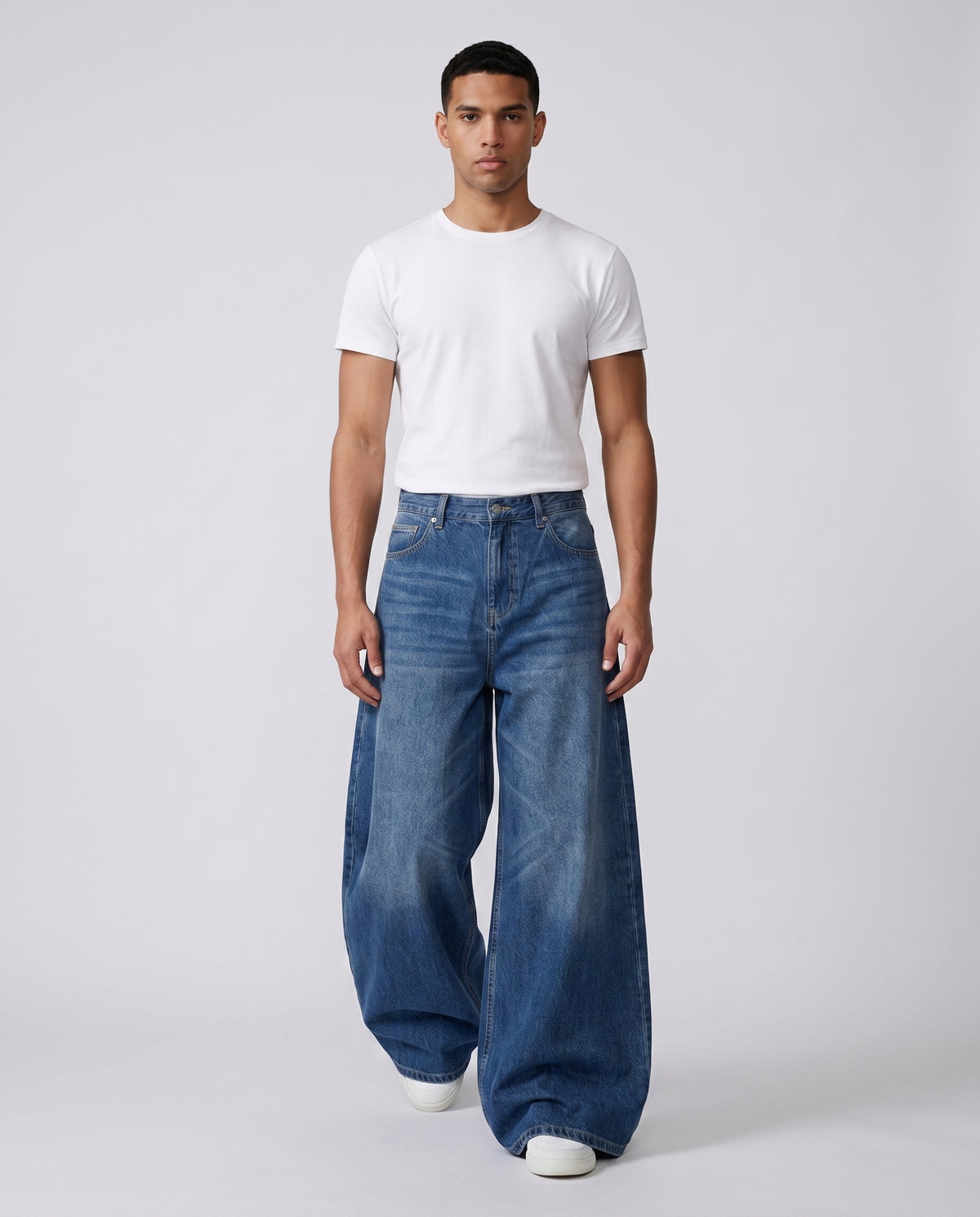 Maxout Jeans Rivet Blue on model — walking, fabric in motion