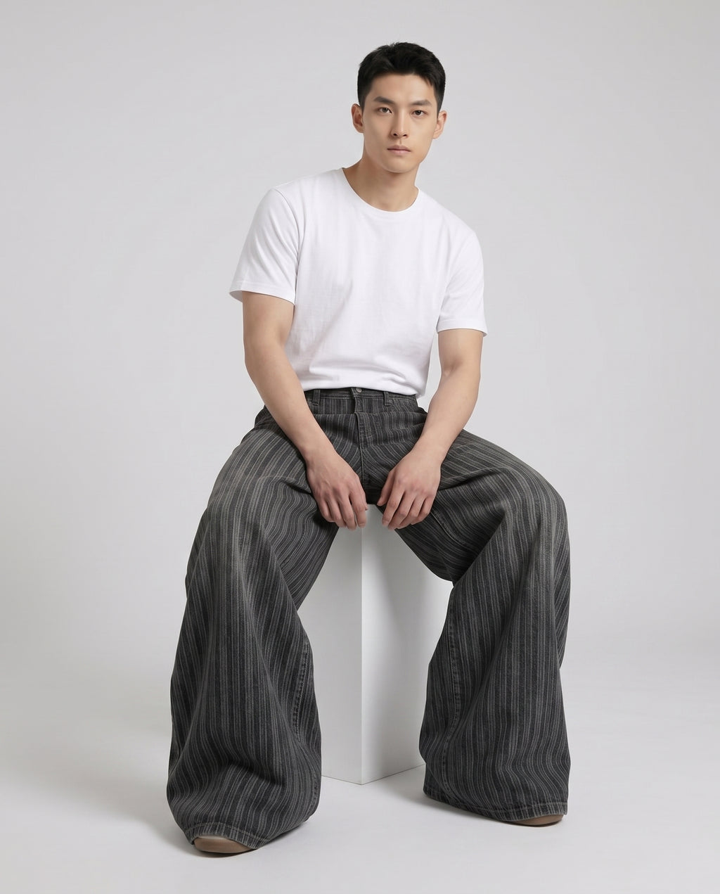 Session Jeans — Pinstripe Fade on model — seated fit view
