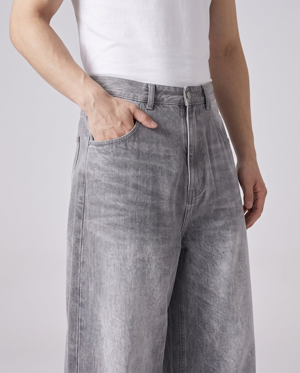 Maxout Jeans Polar White on model — waist and pocket detail