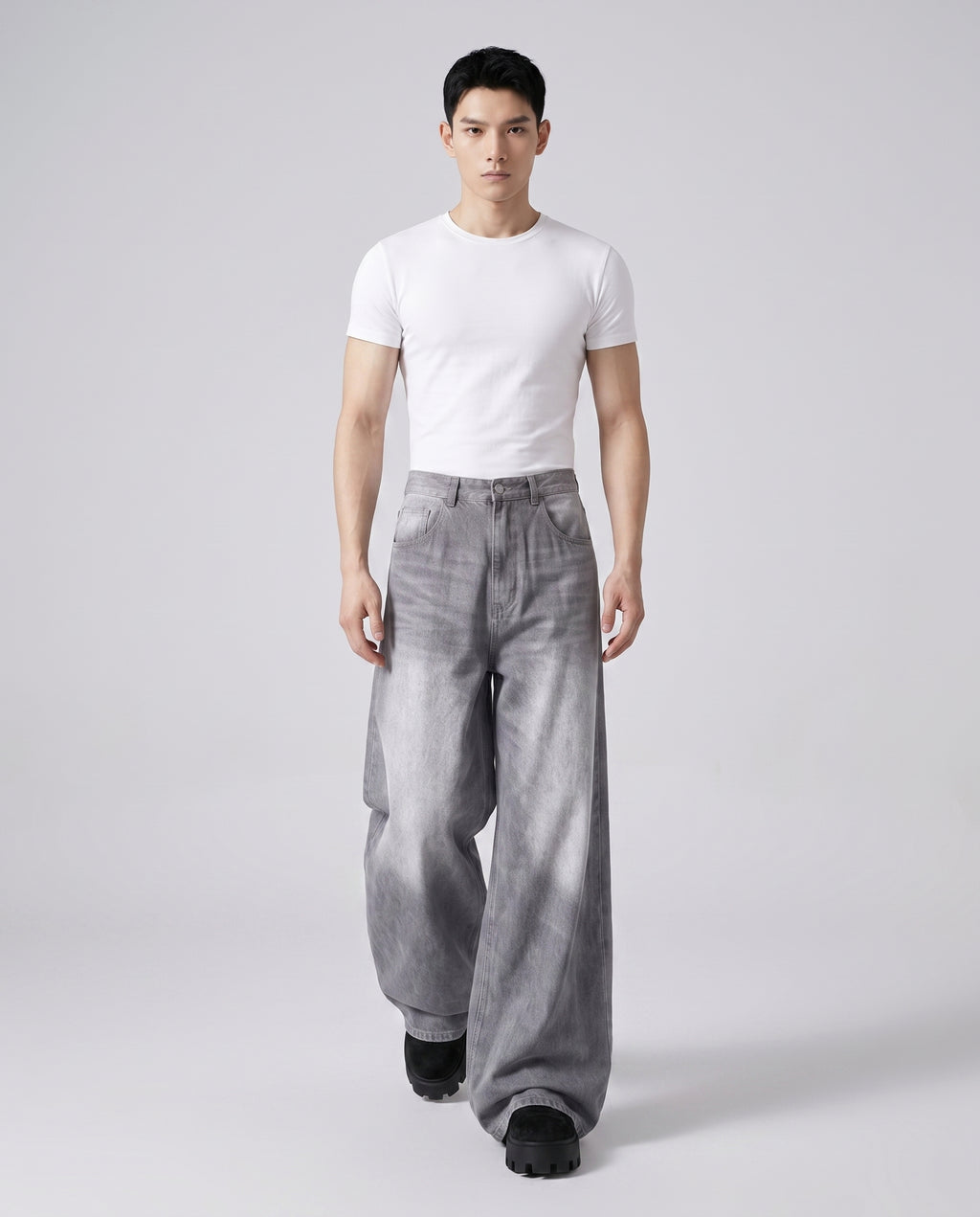 Maxout Jeans Polar White on model — walking, fabric in motion