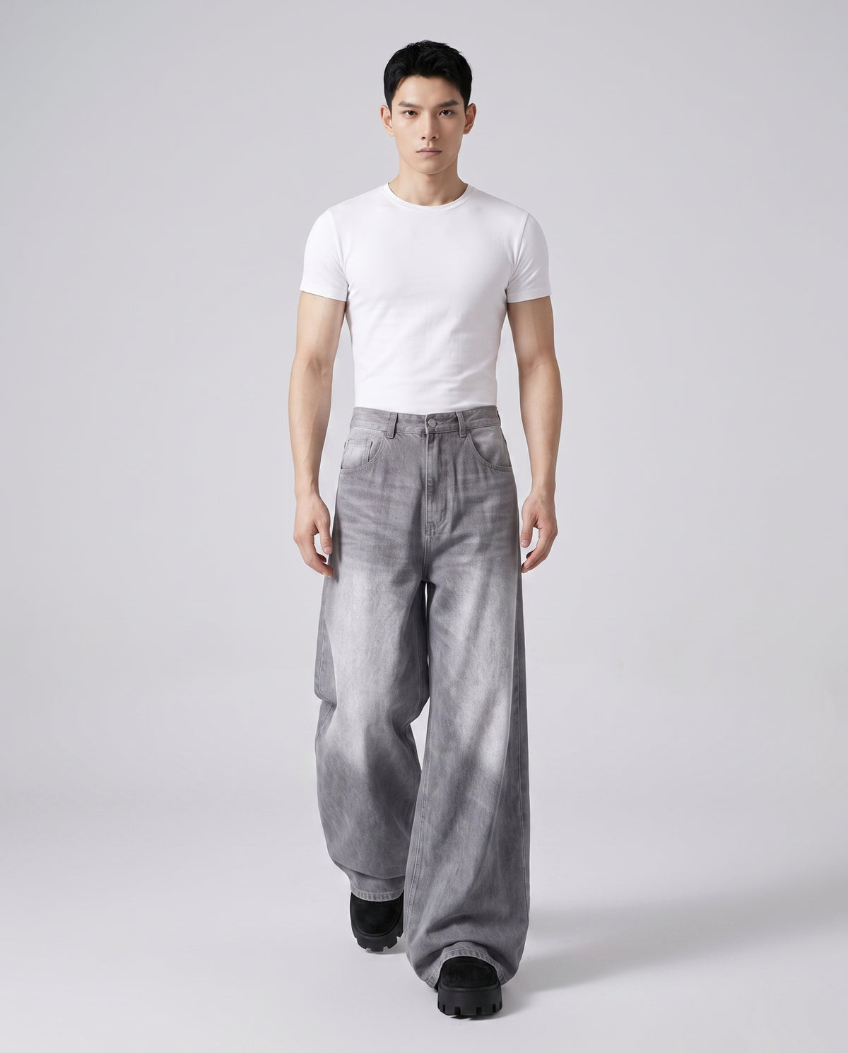 Maxout Jeans Polar White on model — walking, fabric in motion