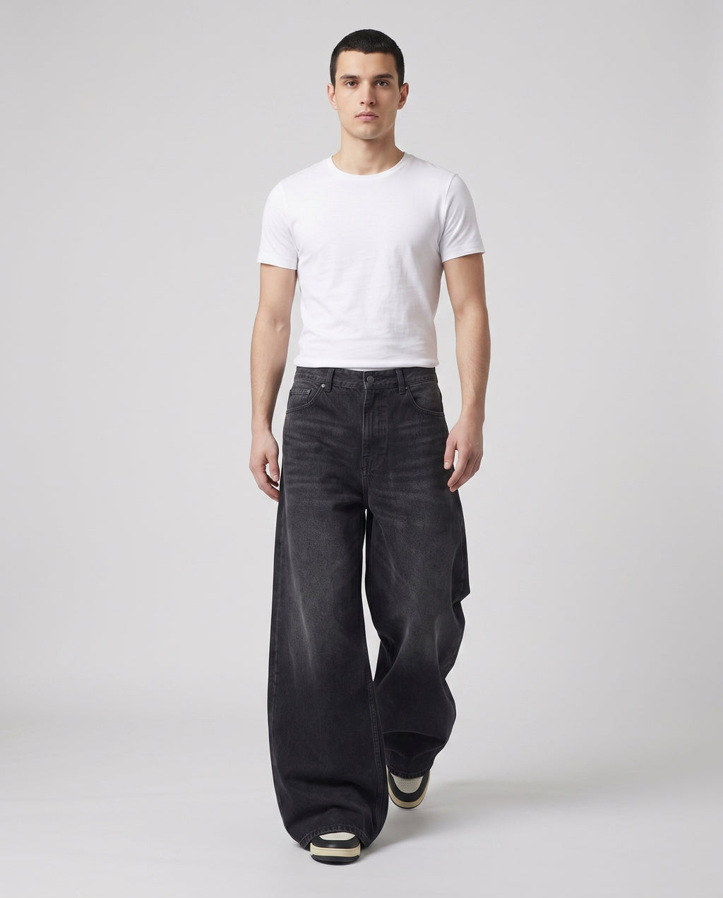 Easy Jeans — Soft Black on model — walking, fabric in motion