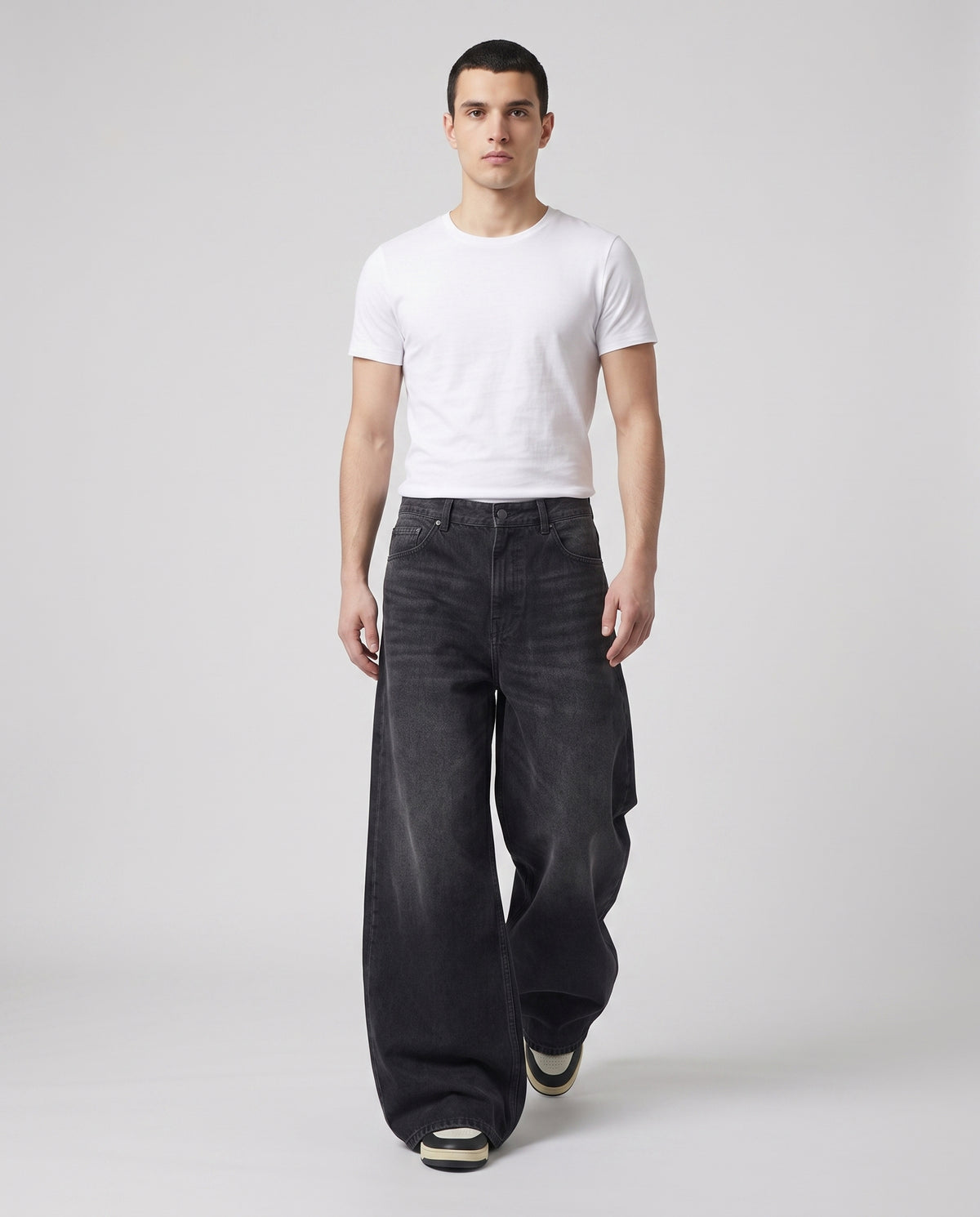 Easy Jeans — Soft Black on model — walking, fabric in motion