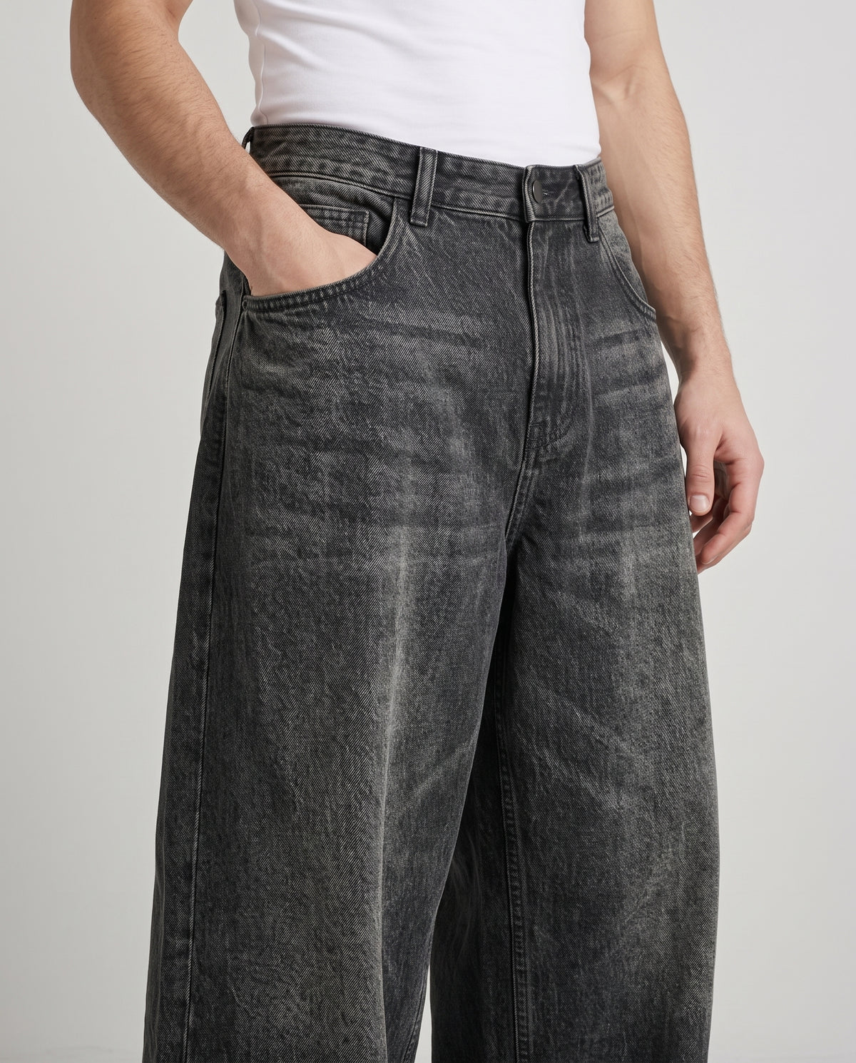 Session Jeans — Graffiti Black on model — waist and pocket detail