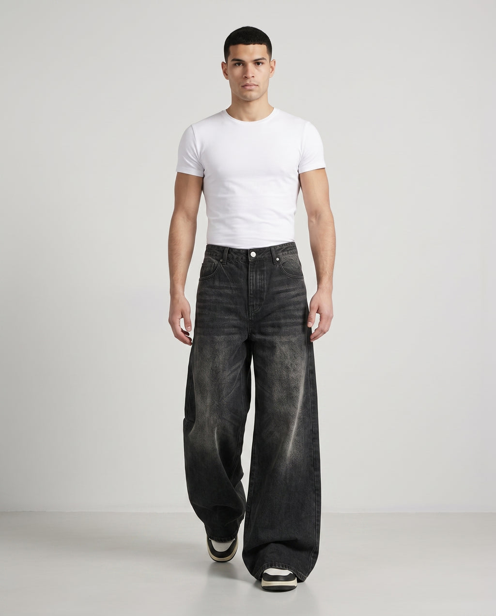 Session Jeans — Graffiti Black on model — walking, fabric in motion