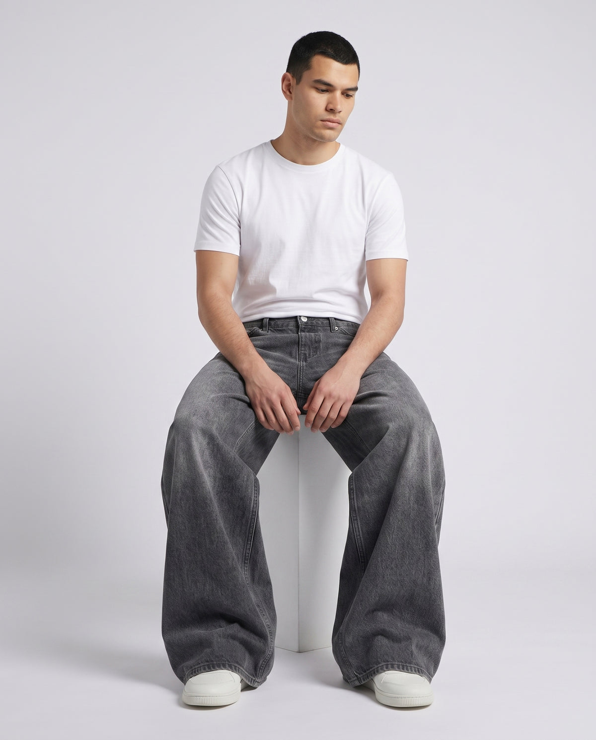 Easy Jeans — City Black on model — seated fit view