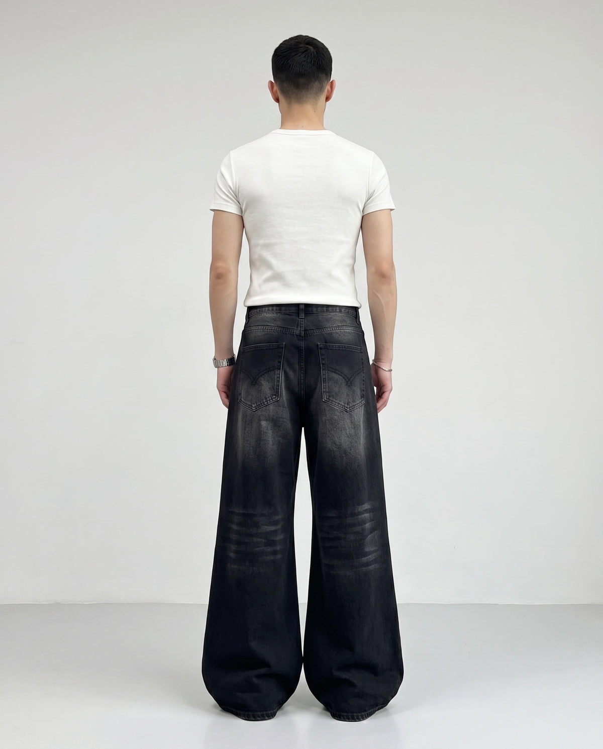 Slack Jeans — Bone Wash on model — back view
