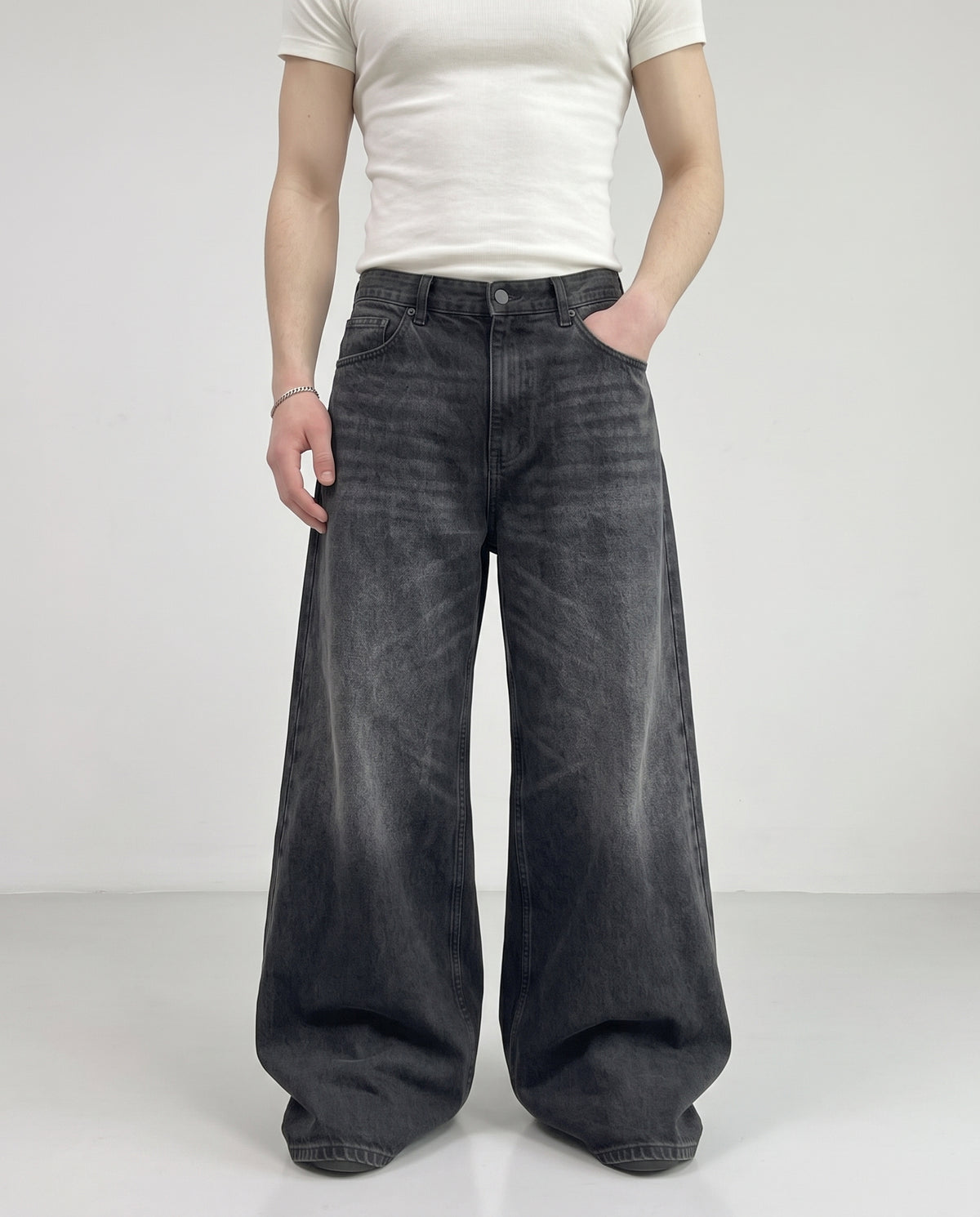 Slack Jeans — Bone Wash on model — waist and pocket detail
