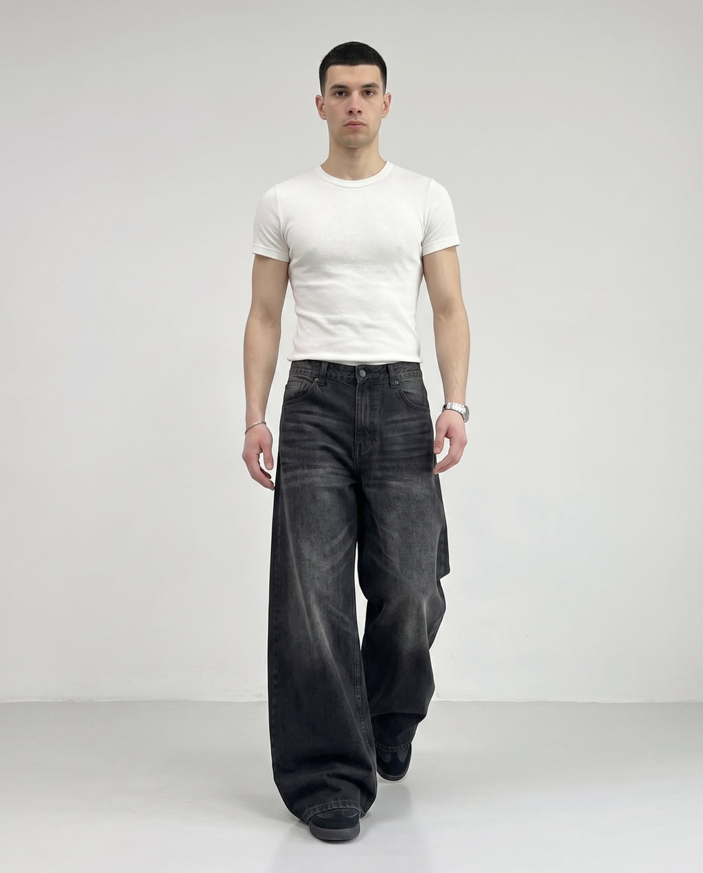 Slack Jeans — Bone Wash on model — walking, fabric in motion