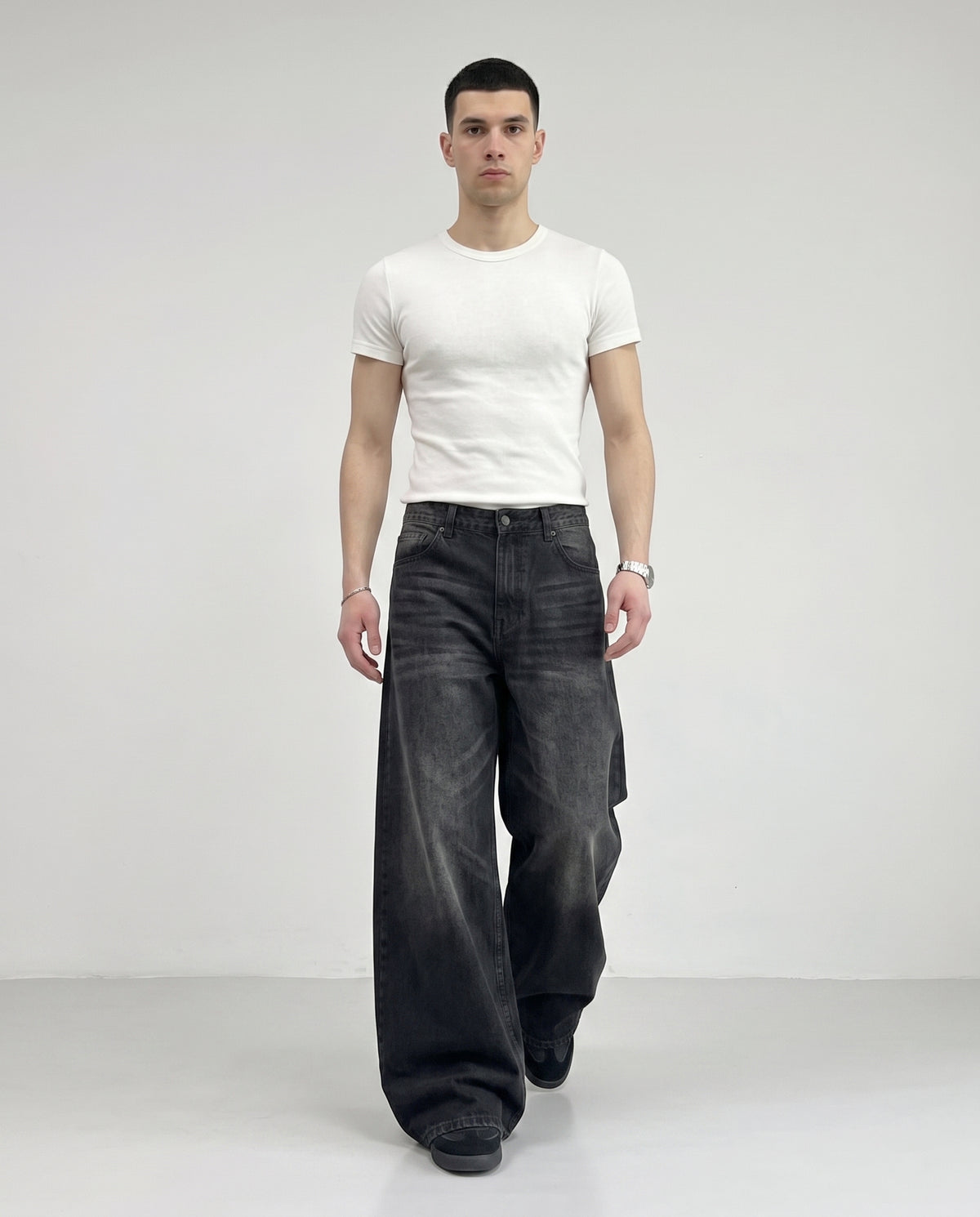 Slack Jeans — Bone Wash on model — walking, fabric in motion