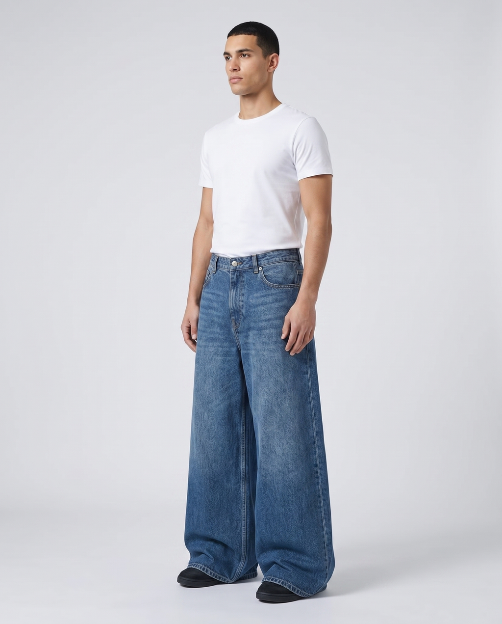 Maxout Jeans — Stonewash on model — three-quarter view