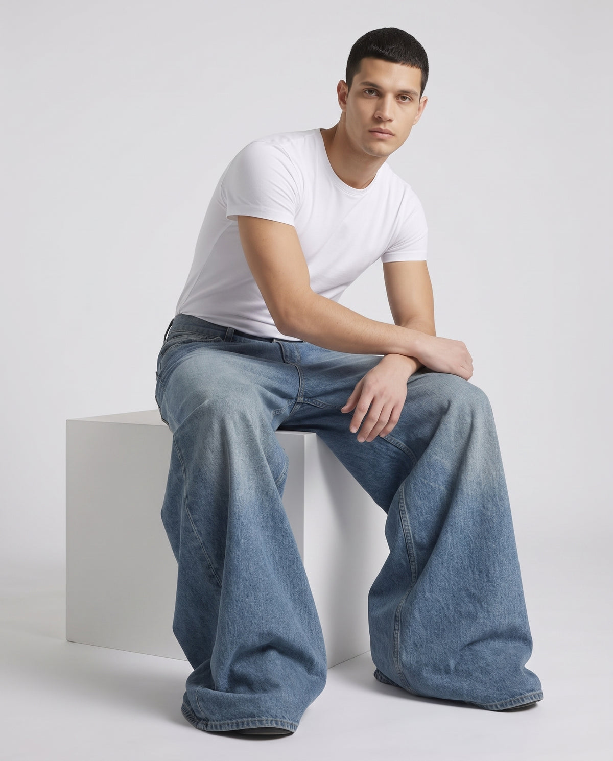 Easy Jeans — River Blue on model — seated fit view