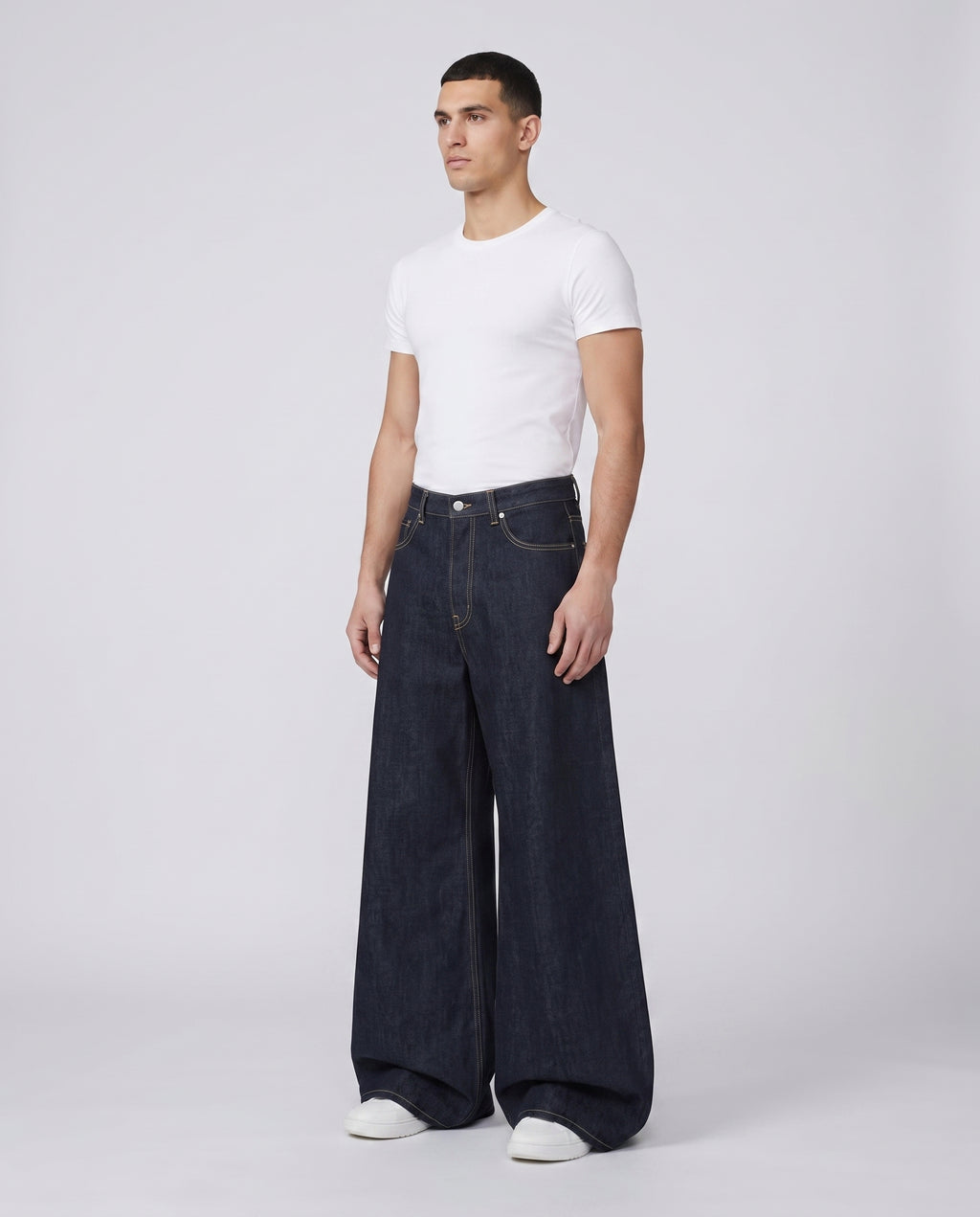 Easy Jeans — River Blue on model — walking, fabric in motion