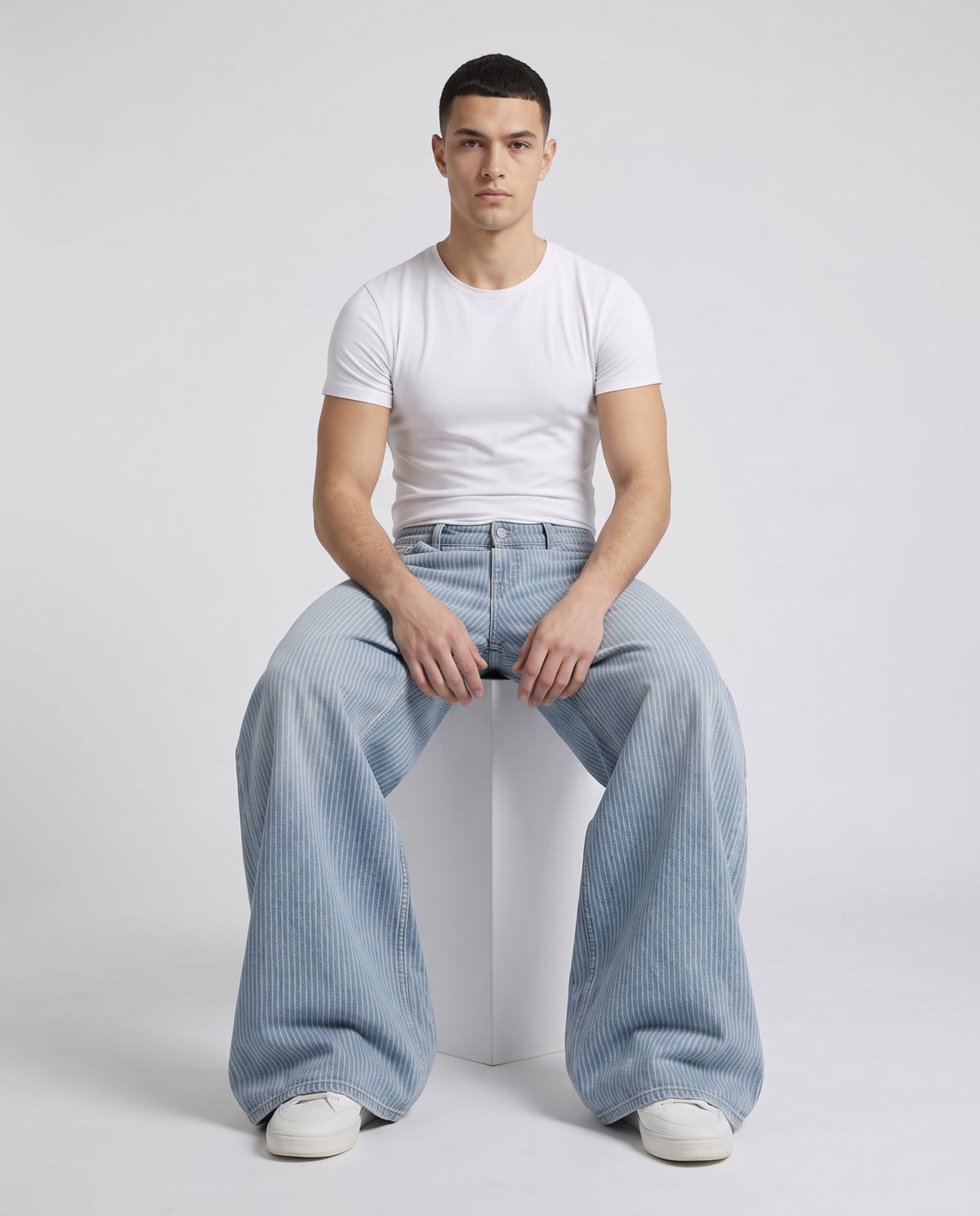 Boulevard Jeans — Rail Stripe on model — /sessions/brave-exciting-hopper/mnt/Downloads/hartford_staging/8091134394470_seated.jpg