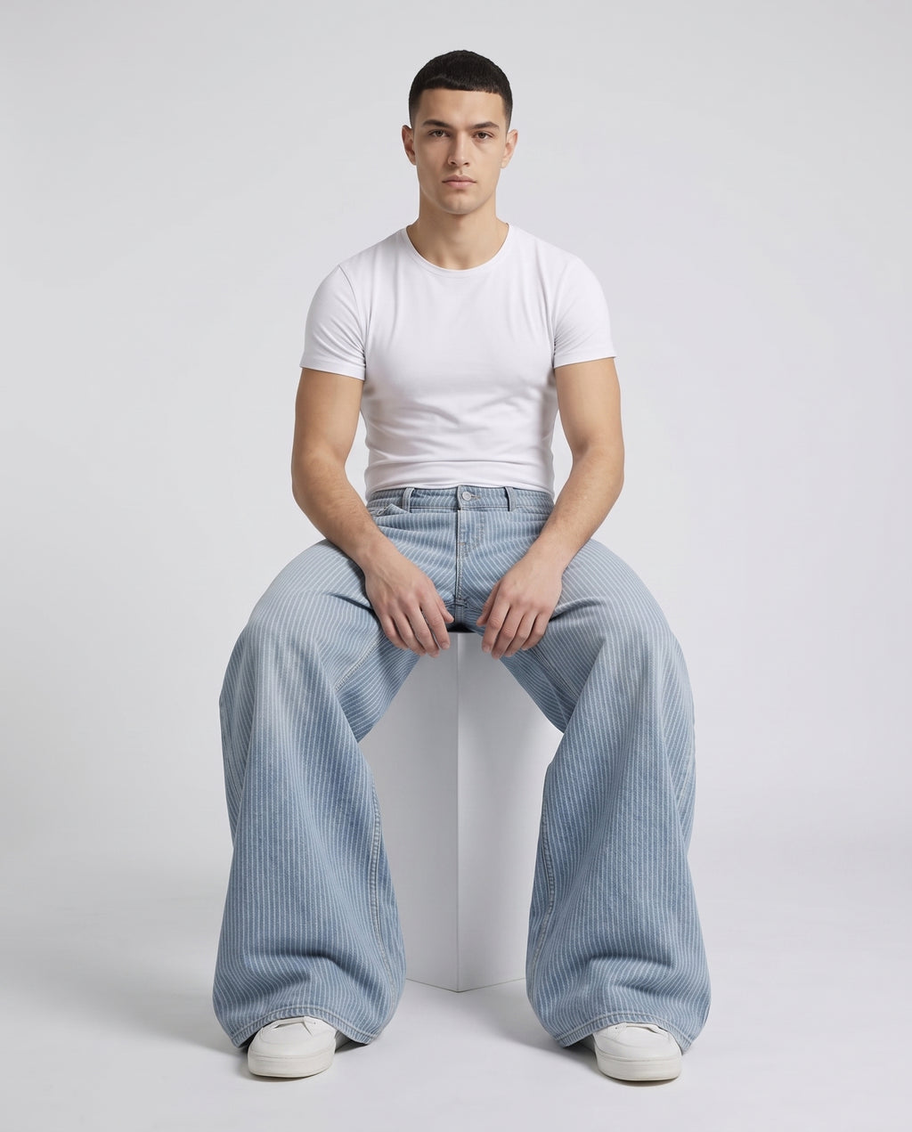 Boulevard Jeans — Rail Stripe on model — seated fit view