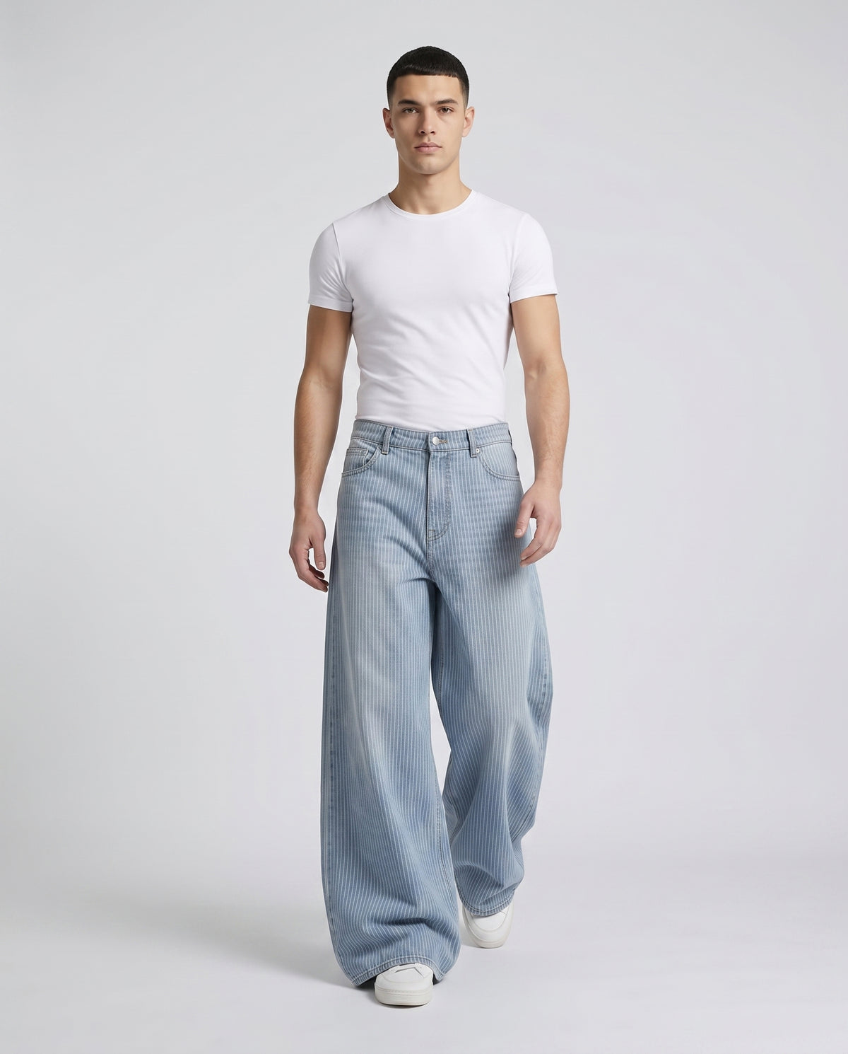 Boulevard Jeans — Rail Stripe on model — /sessions/brave-exciting-hopper/mnt/Downloads/hartford_staging/8091134394470_walking.jpg