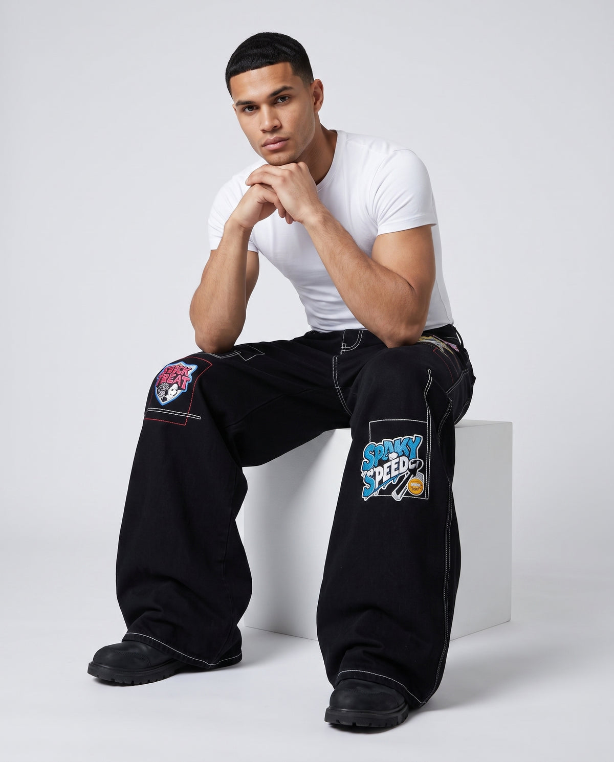 Maxout Jeans — Obsidian on model — seated fit view
