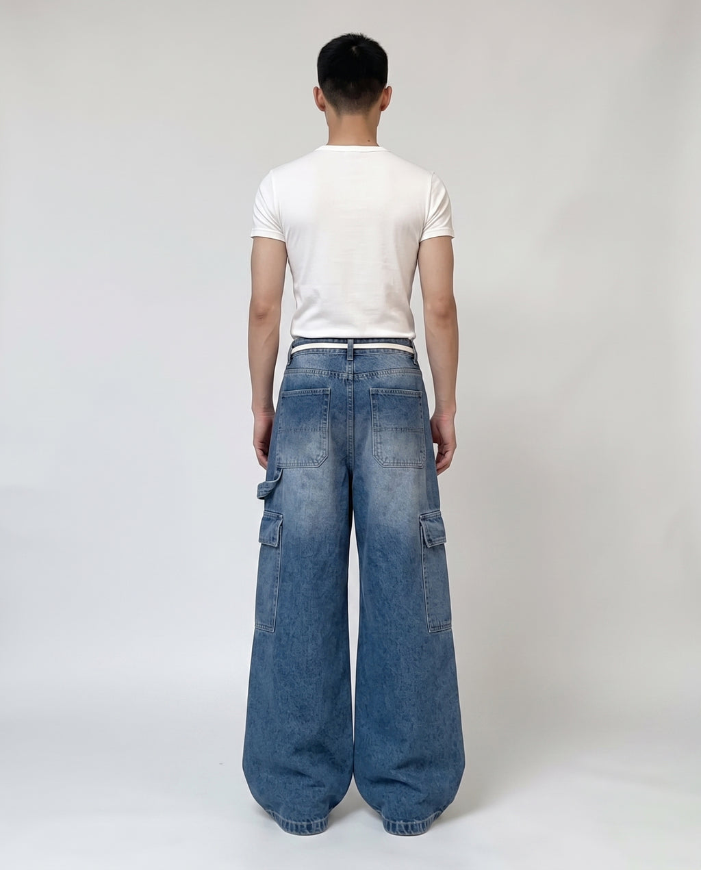 Foreman Jeans — Motor Blue on model — back view
