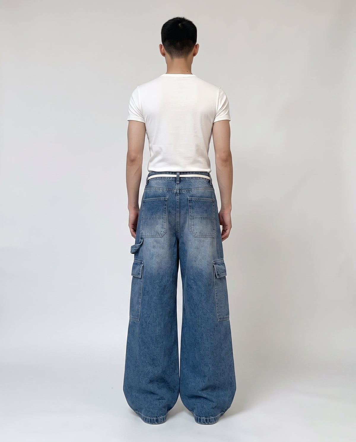 Foreman Jeans — Motor Blue on model — back view