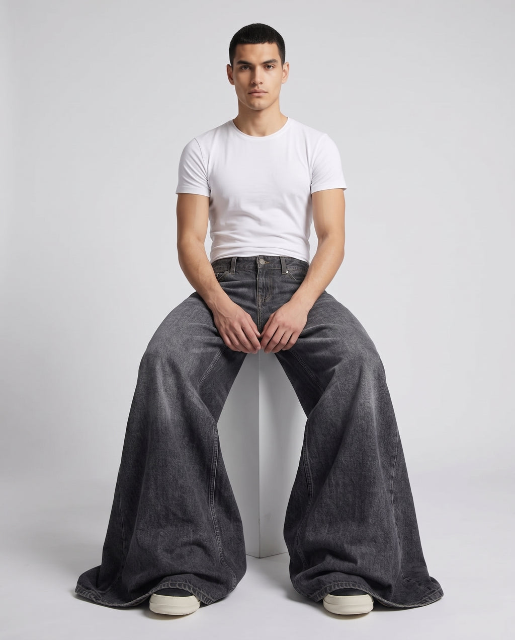 Easy Jeans Midnight Fade on model — seated fit view