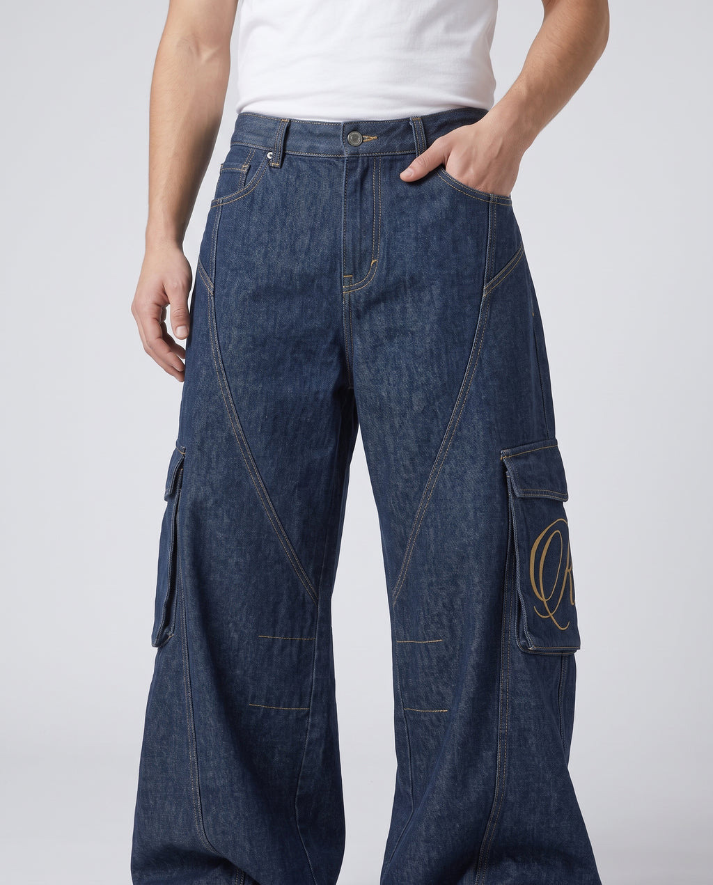 Cooper Jeans Lumber Wash on model — waist and pocket detail