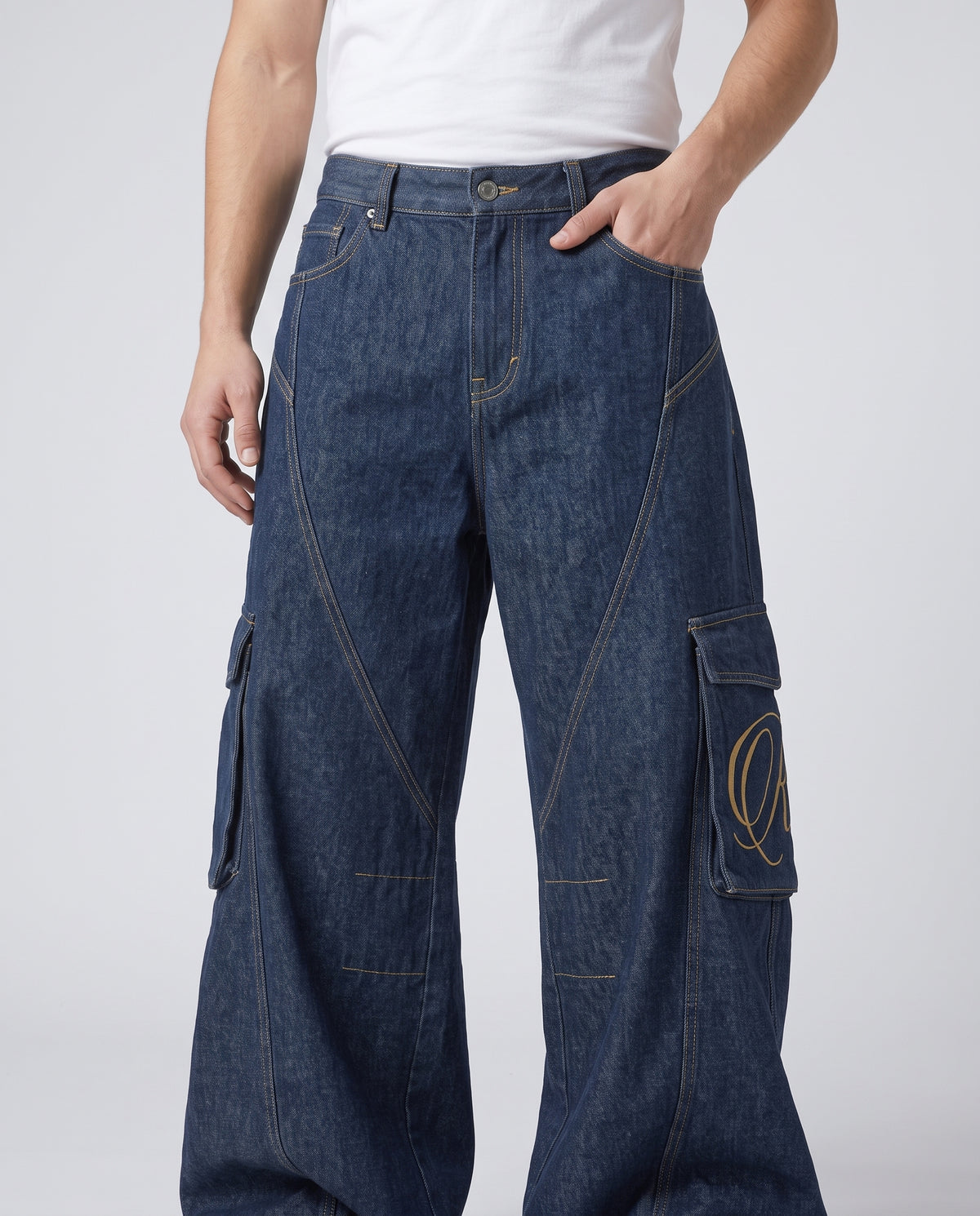 Cooper Jeans Lumber Wash on model — waist and pocket detail