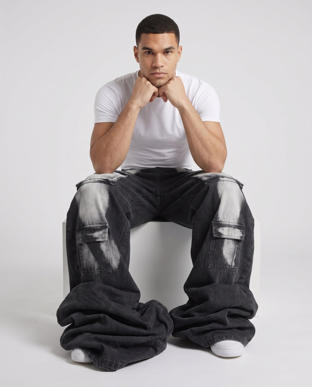 Foreman Jeans — Ink Splash on model — seated fit view