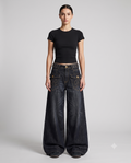 Women's Baggy Jeans Bamboo Wash on model — mega baggy fit covering shoes