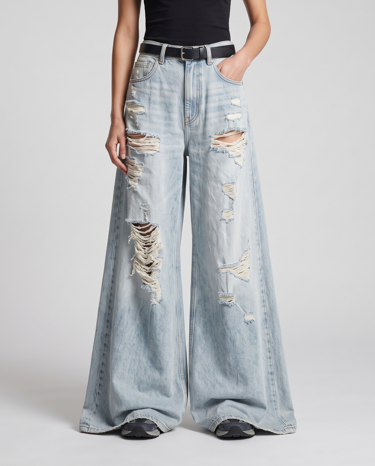 Women's Ripped Baggy Jeans — Sun Bleach on model — waist and pocket detail
