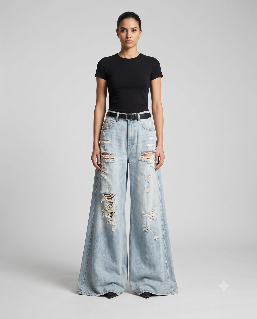 Women's Ripped Baggy Jeans Sun Bleach on model — mega baggy fit covering shoes