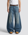 Big Easy baggy jeans in patchwork wash on model — ultra wide fit