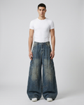 Big Easy cargo jeans in vintage wash on model — mega baggy fit with side pockets