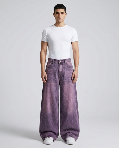 Big Easy baggy jeans in washed purple on model — mega baggy fit covering shoes