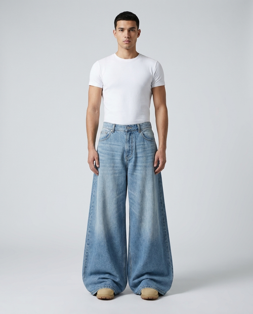 Big Easy baggy jeans in light wash on model — mega baggy silhouette