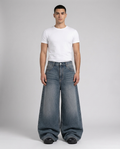 Big Easy baggy jeans in faded indigo on model — ultra wide leg