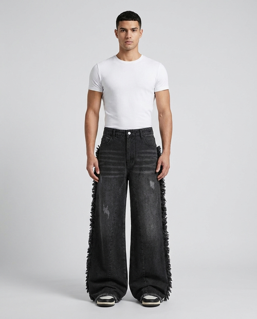Big Easy baggy jeans in frayed black on model — ultra wide fit with side fringe